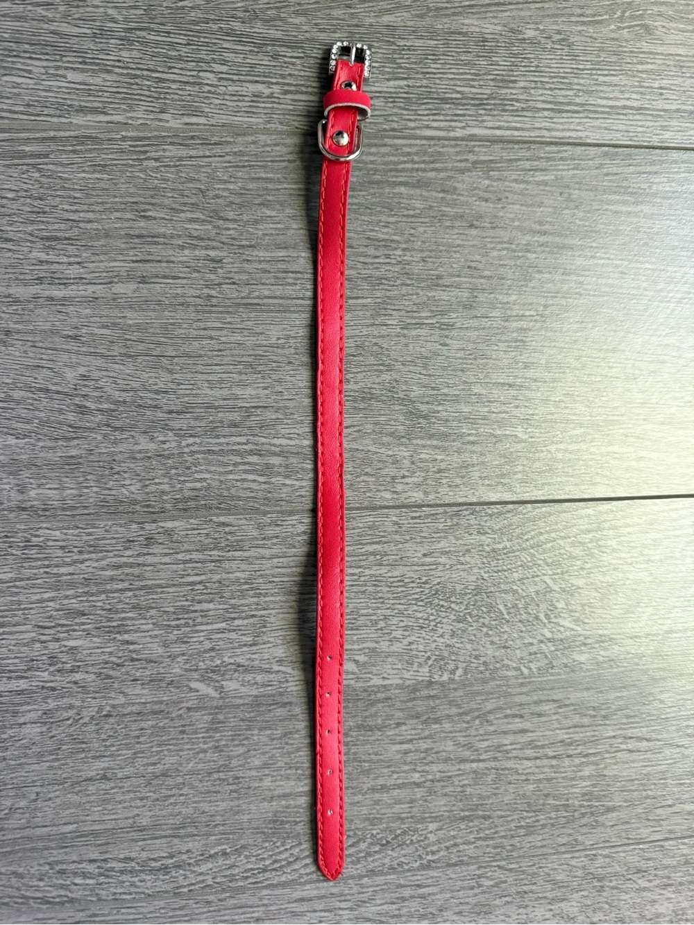 Red leather small dog leash and collar set.featuring 
Silver and rhinestones.